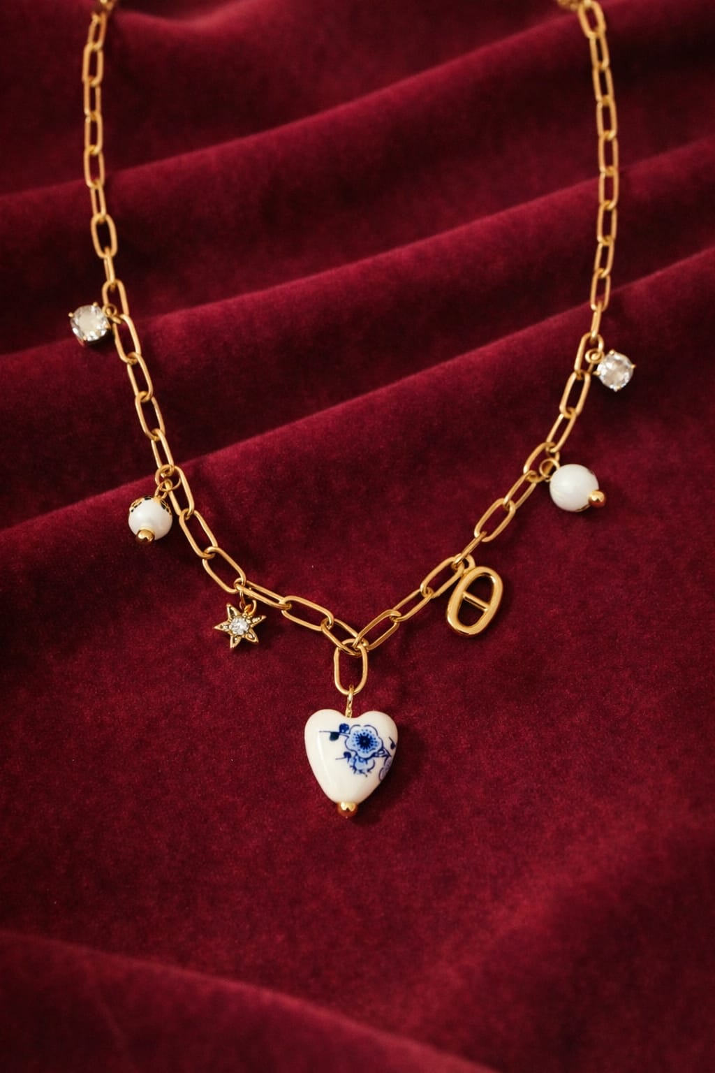 Golden Charm Heart Pearl Necklace for Women | Multi Charm Statement Chain | Isha Elite