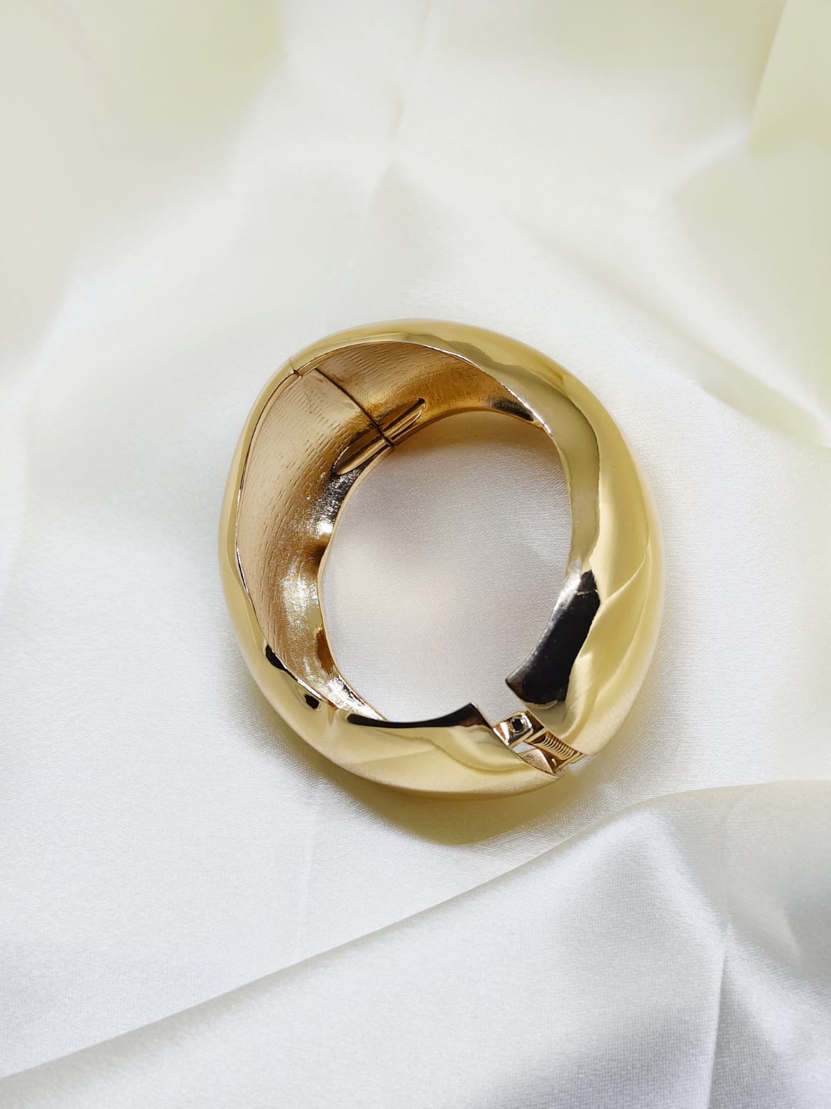 Sculpted Wave Gold Statement Bracelet for Women | Modern Designer Bangle | Isha Elite